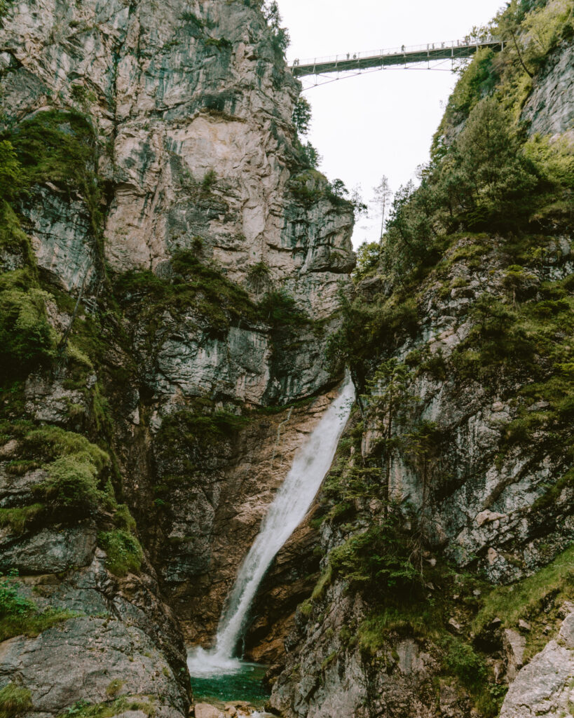bridge over a waterfall in bavaria